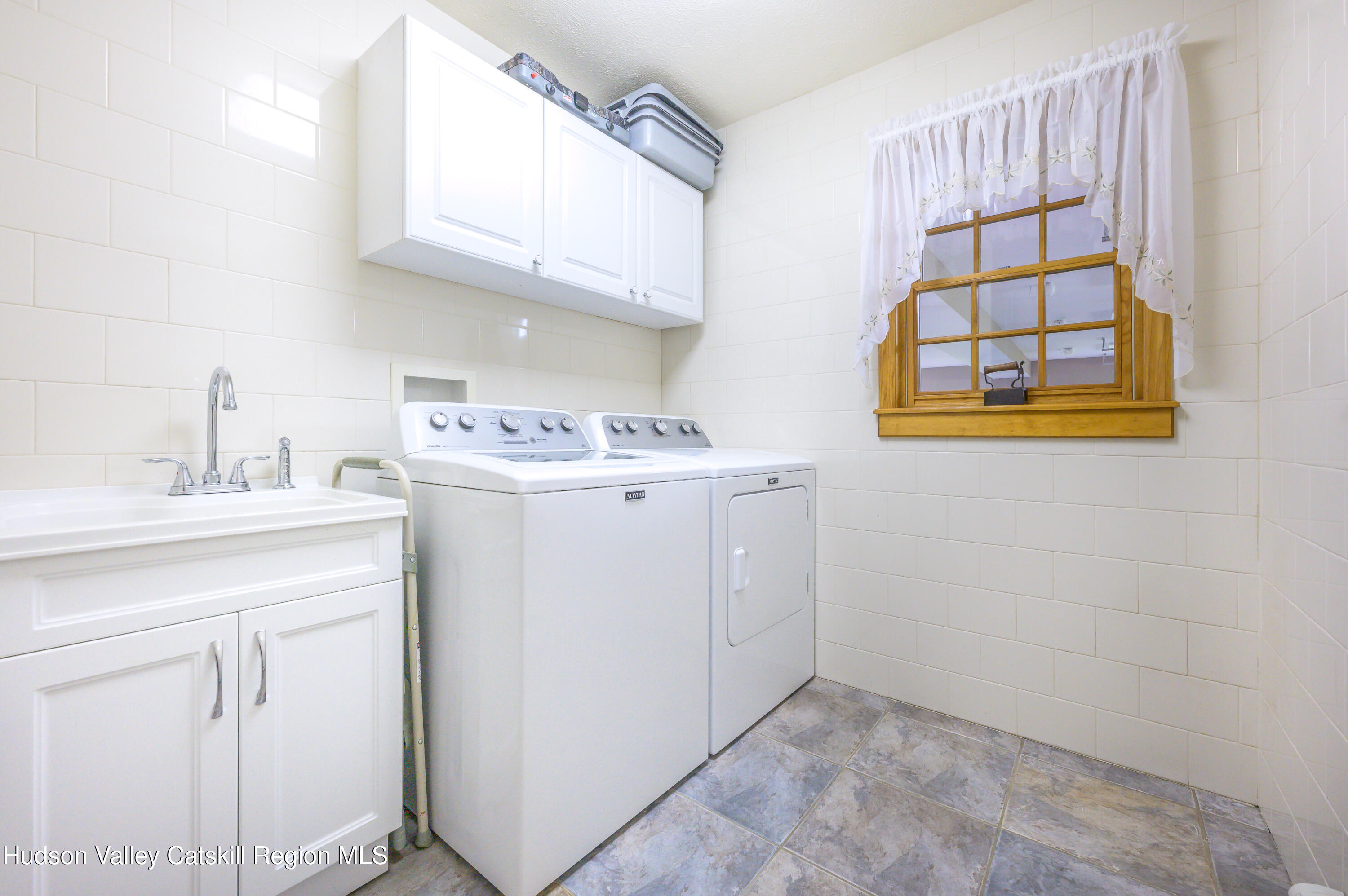 520 Ridge Road Stuyvesant, NY 12156 - Photo 40 of 68 a utility room with a sink a washer and dryer