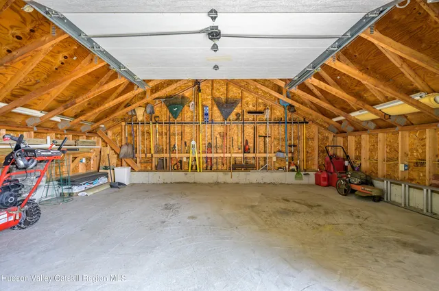 a backyard of a house with lots of green space and garden