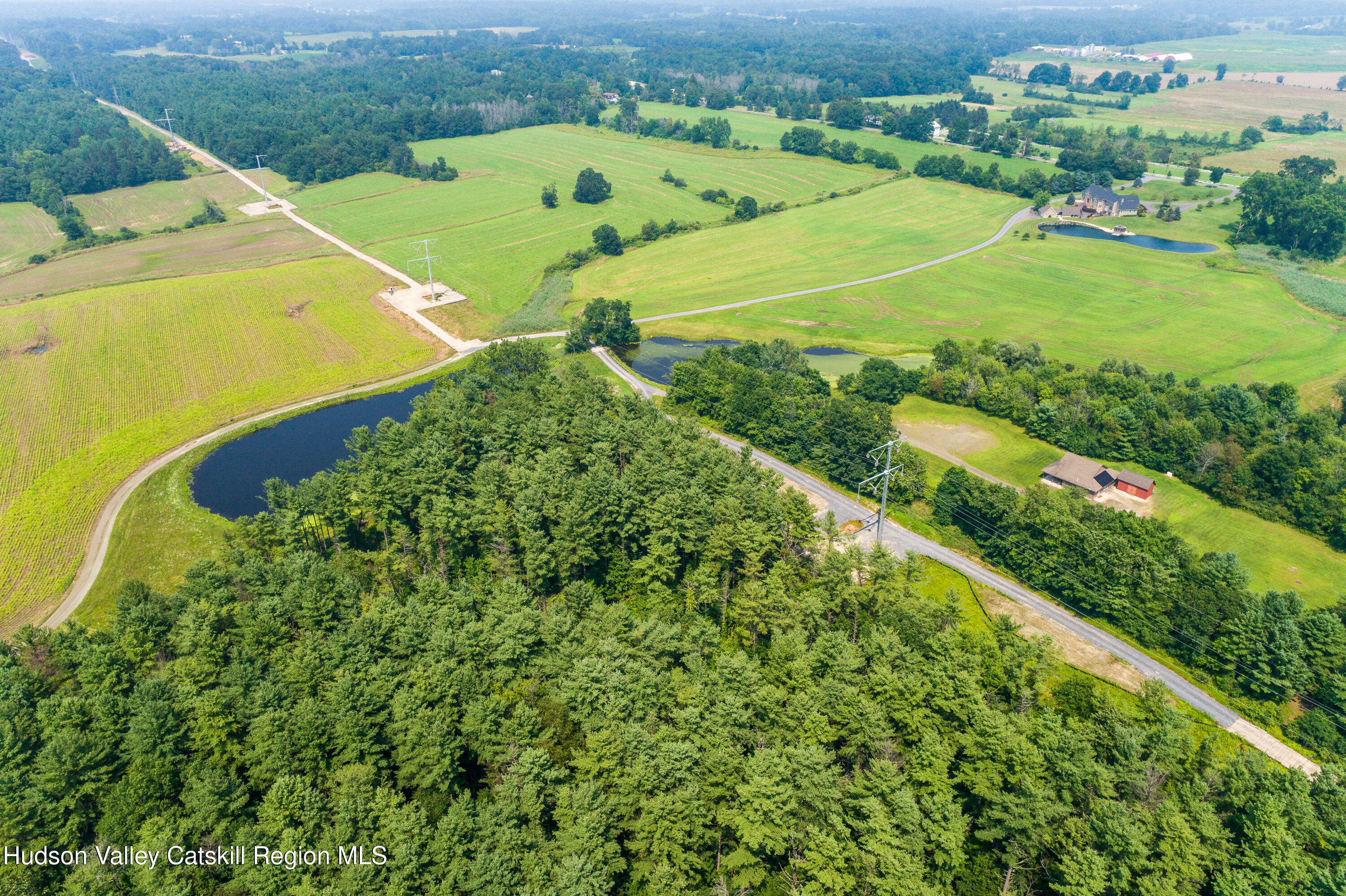 520 Ridge Road Stuyvesant, NY 12156 - Photo 49 of 68 an aerial view of a tennis ground and a houses
