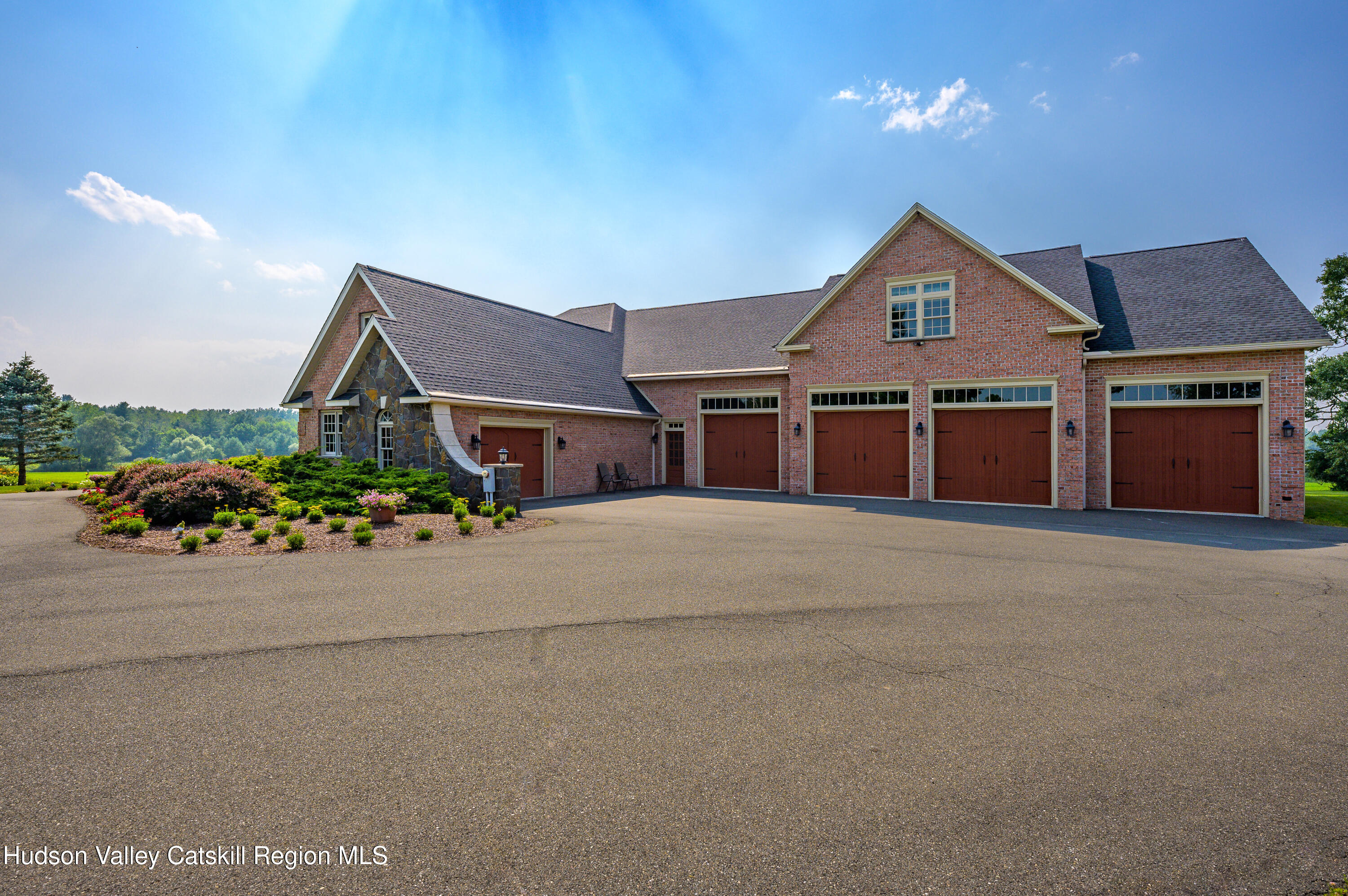 520 Ridge Road Stuyvesant, NY 12156 - Photo 51 of 68 a front view of a house with a yard and garage