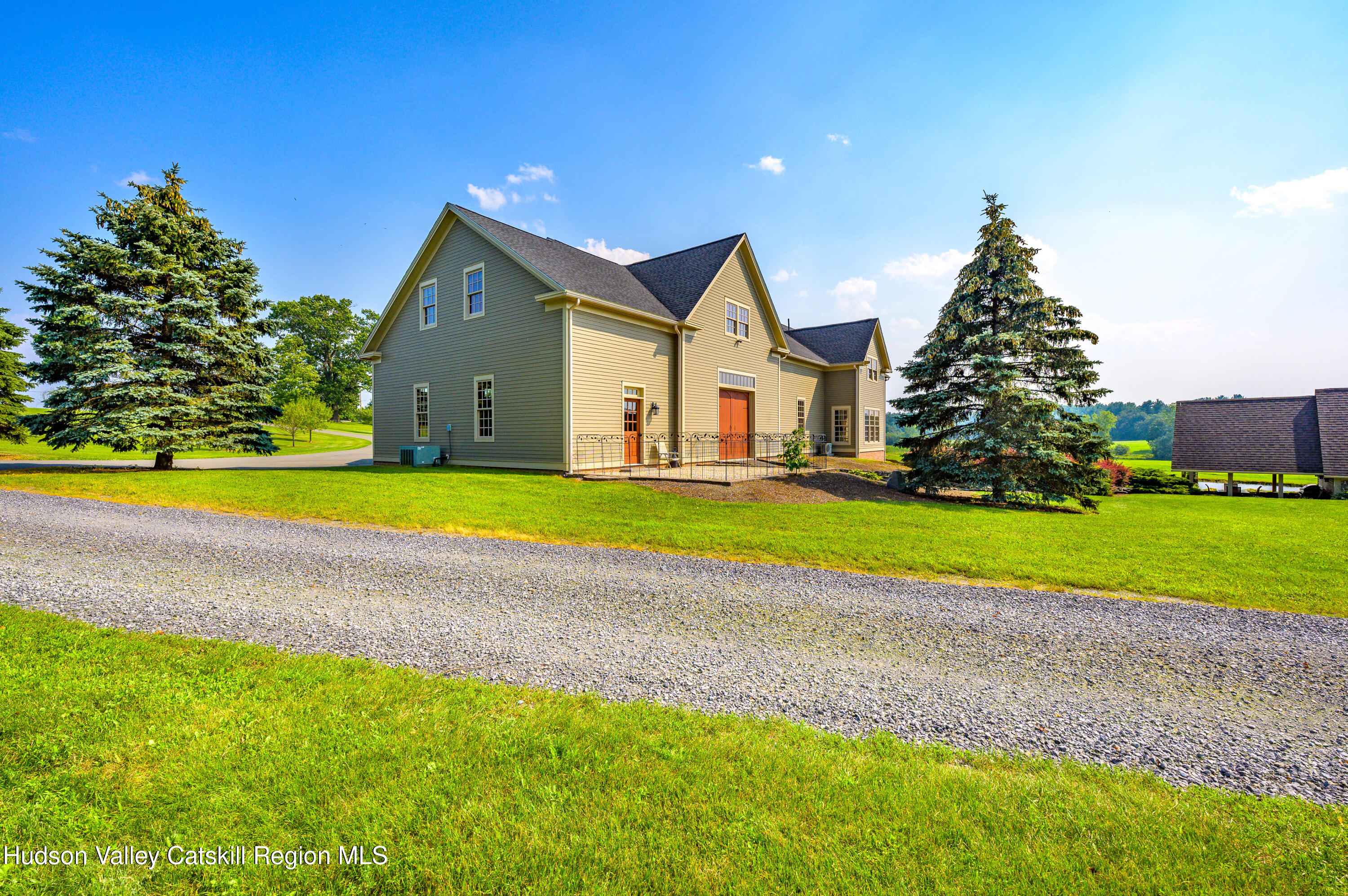 520 Ridge Road Stuyvesant, NY 12156 - Photo 52 of 68 a house with green field in front of it