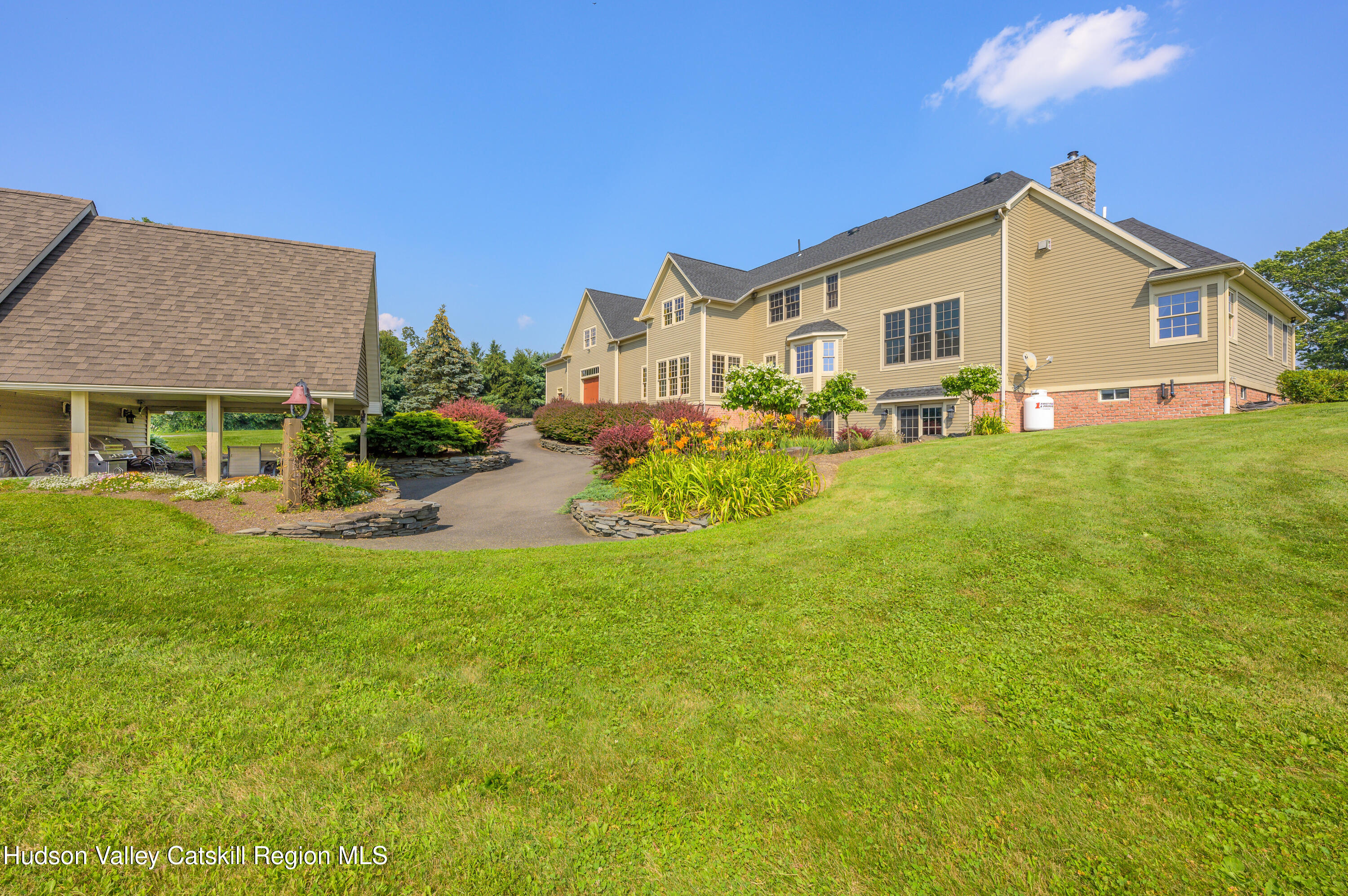 520 Ridge Road Stuyvesant, NY 12156 - Photo 55 of 68 a view of a house with backyard porch and garden