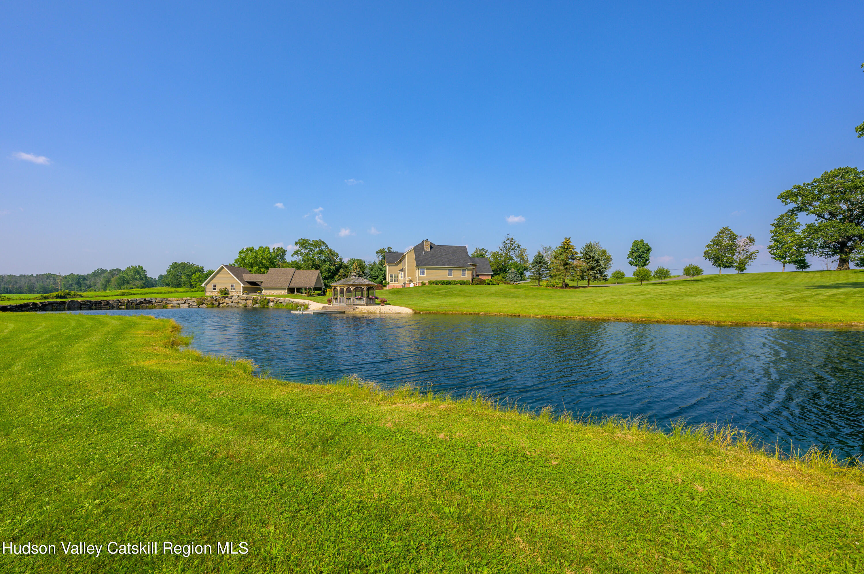 520 Ridge Road Stuyvesant, NY 12156 - Photo 59 of 68 a view of a swimming pool with an outdoor space and seating area