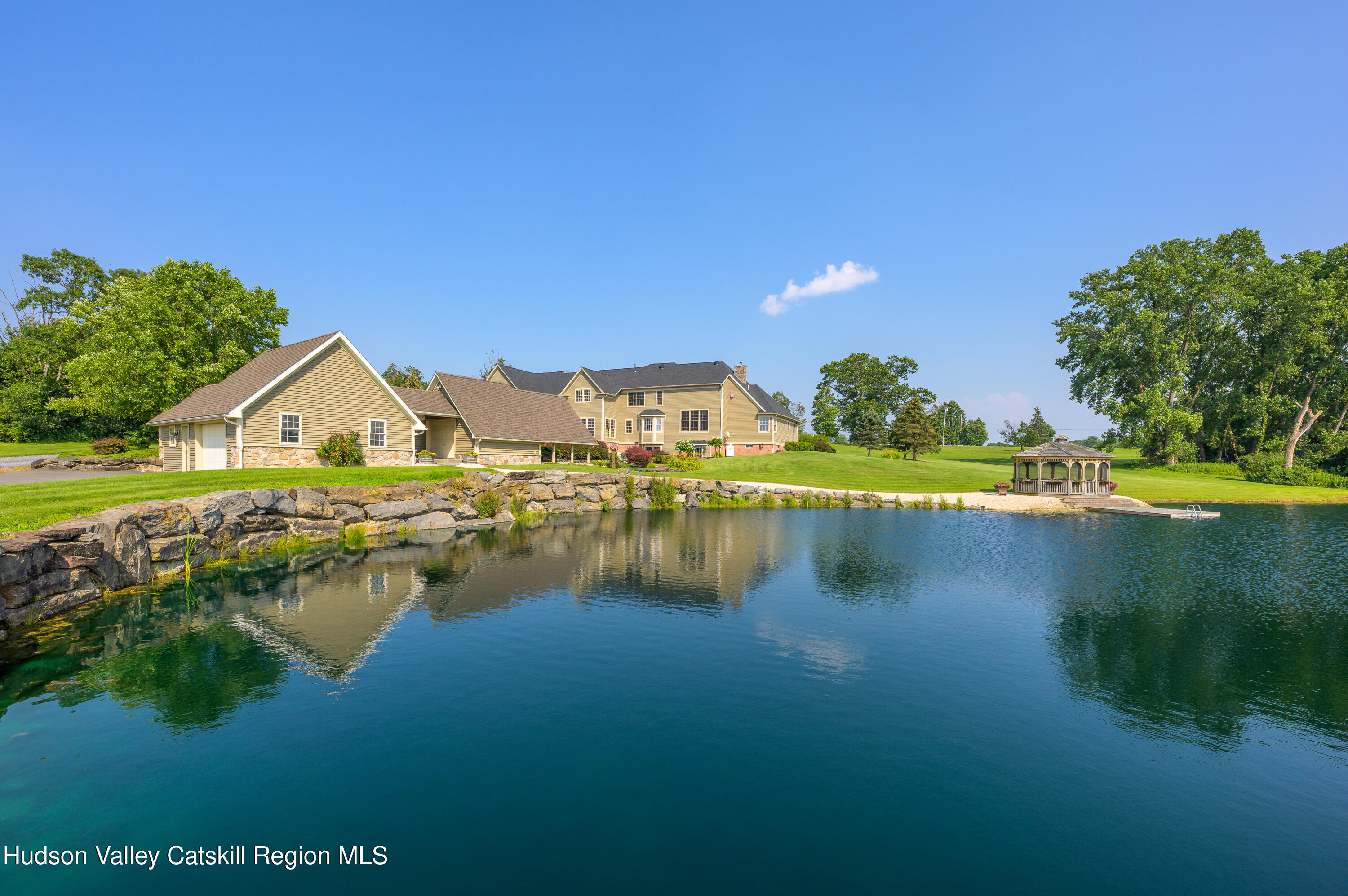 520 Ridge Road Stuyvesant, NY 12156 - Photo 61 of 68 a view of a house with a yard and a pond