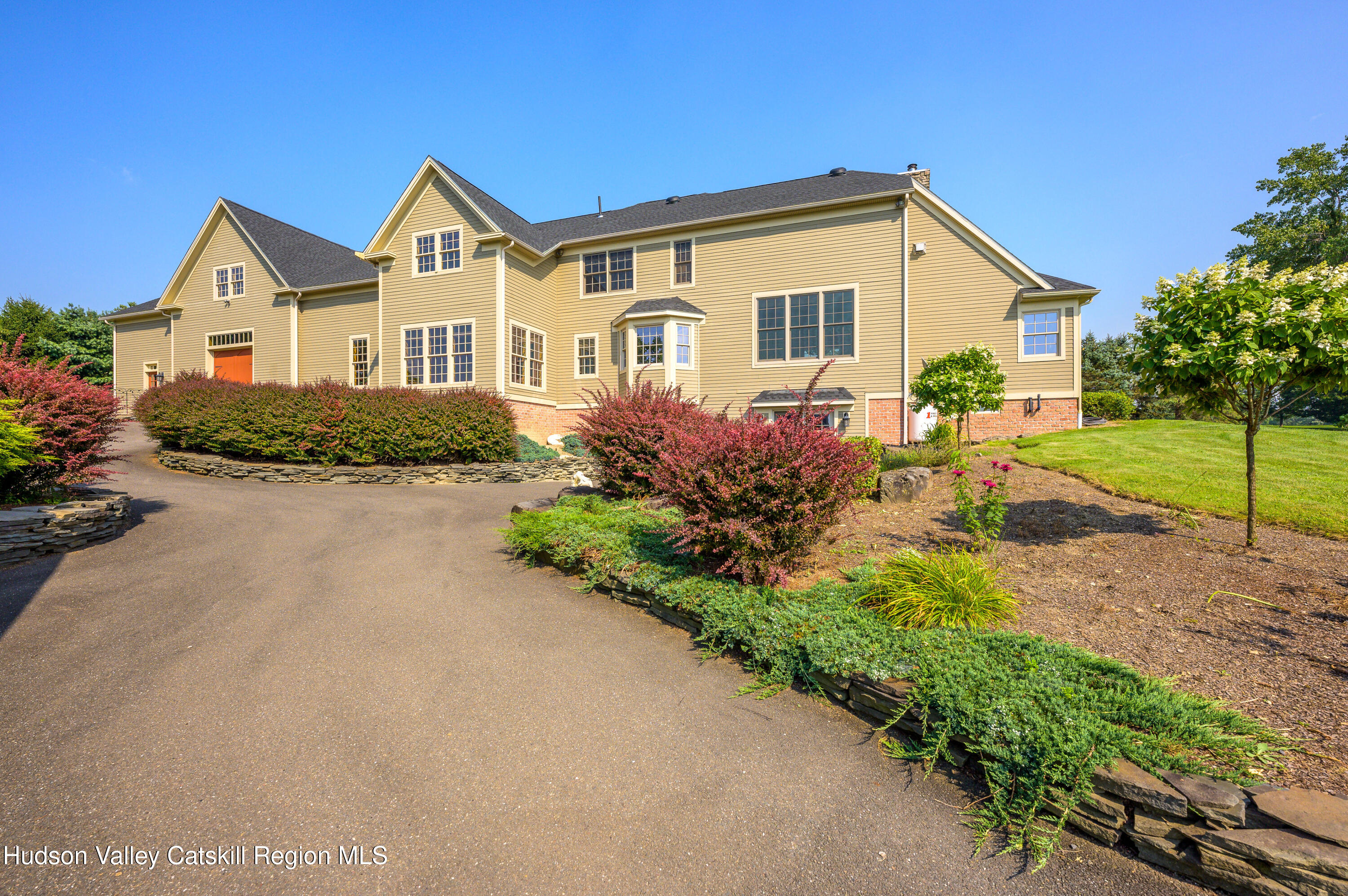 520 Ridge Road Stuyvesant, NY 12156 - Photo 64 of 68 a front view of a house with a yard and porch
