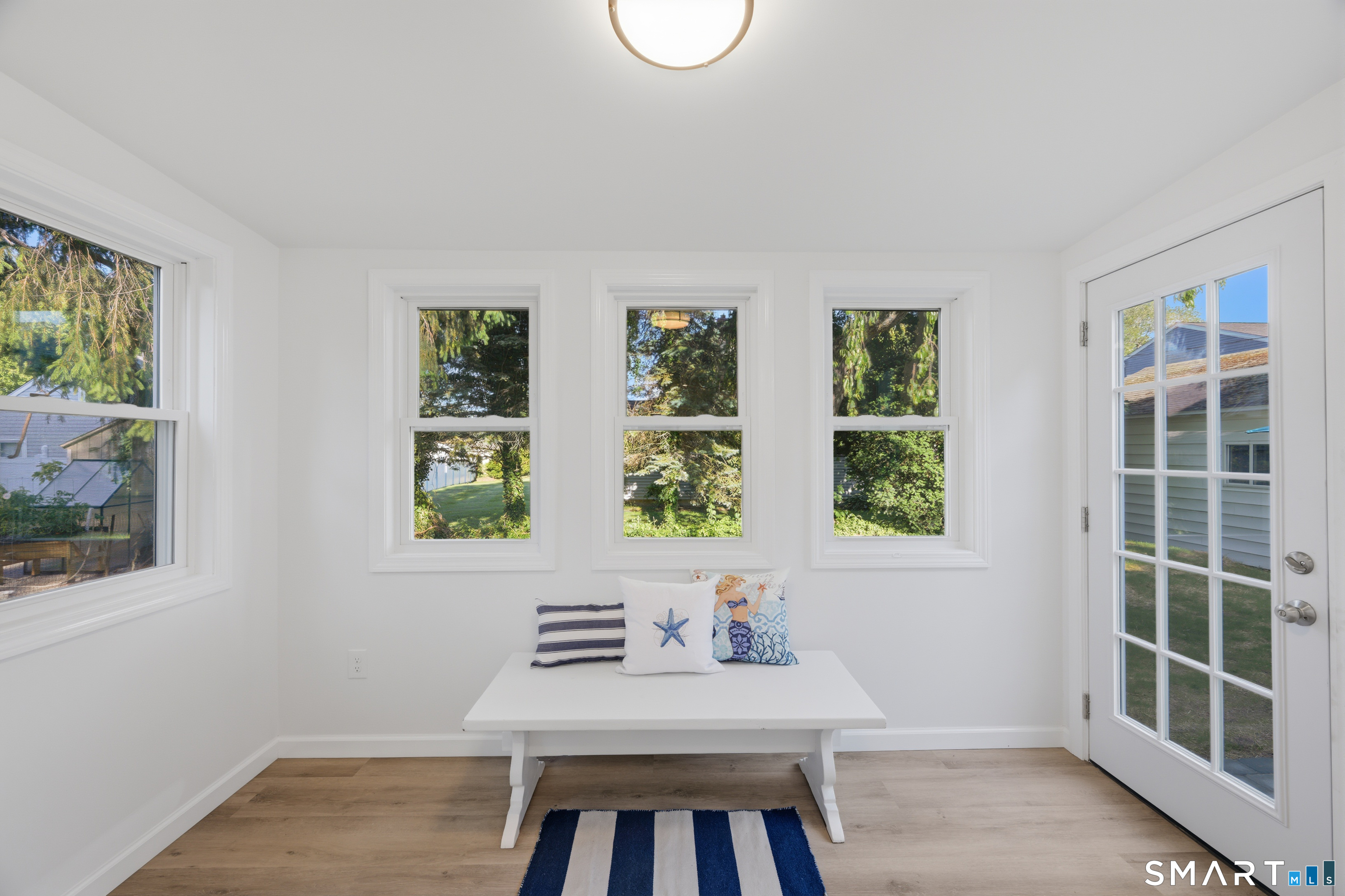 52 Chalker Beach Road Old Saybrook, CT 06475 - Photo 14 of 32 Sun room