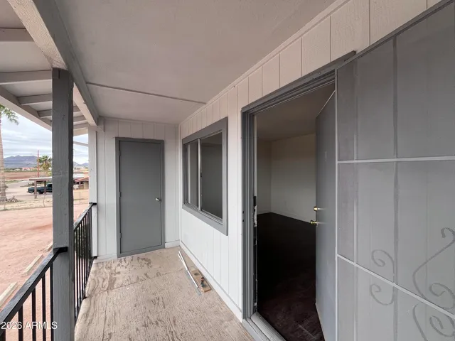 a view of hallway with livingroom