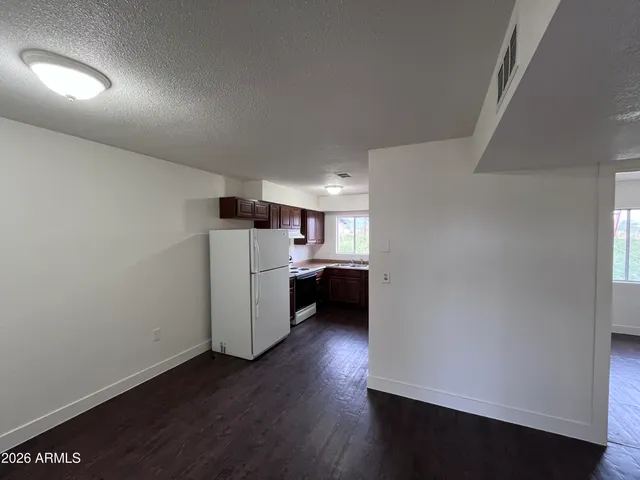 a view of a storage & utility room with a sink