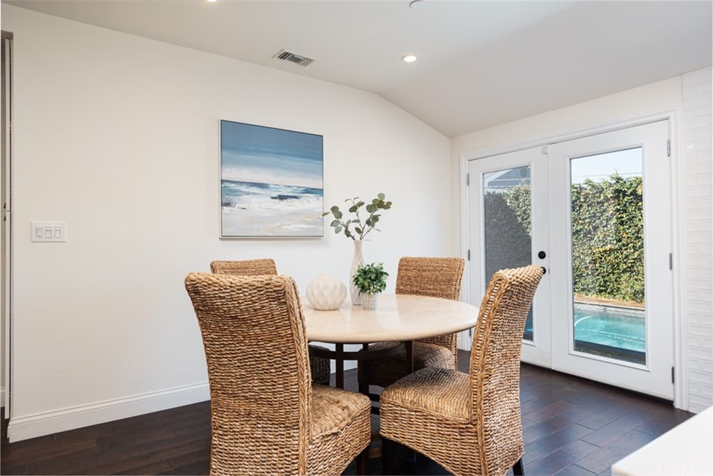 1609 Chestnut Avenue Manhattan Beach, CA 90266 - Photo 12 of 26 a view of a dining room with furniture window and wooden floor