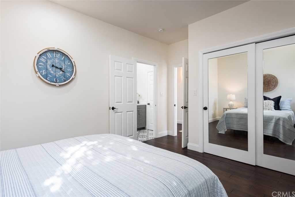 1609 Chestnut Avenue Manhattan Beach, CA 90266 - Photo 14 of 26 a bedroom with a bed and a view of bathroom