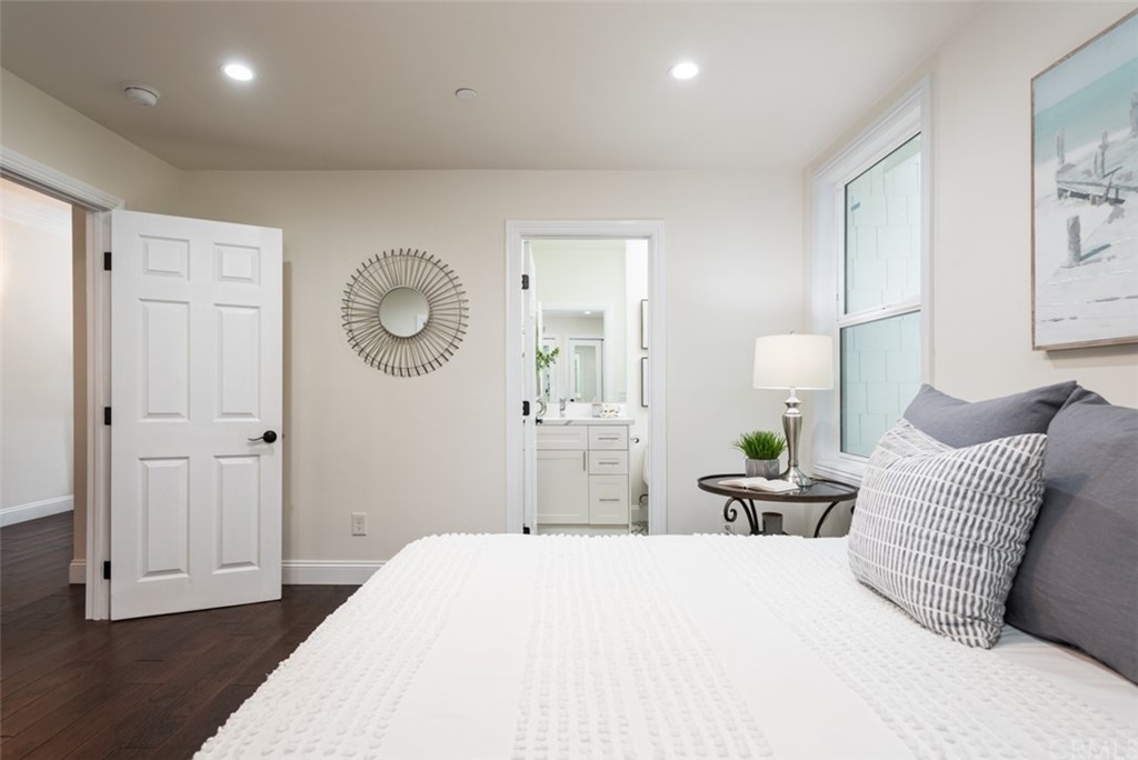 1609 Chestnut Avenue Manhattan Beach, CA 90266 - Photo 17 of 26 a bedroom with a bed and window