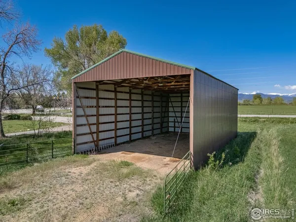 a view of a lake with a big yard