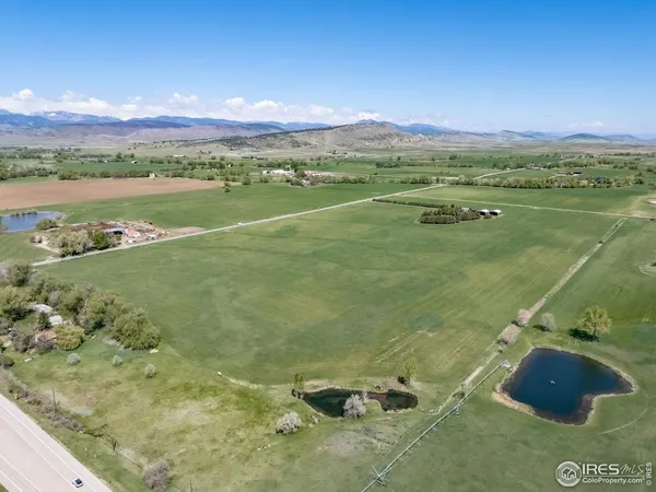 a view of an ocean and a yard