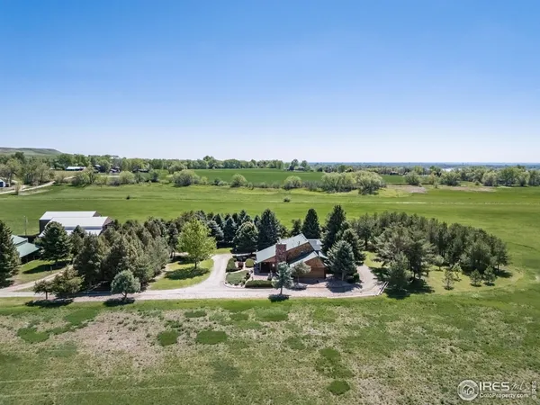 a view of a lake with a big yard