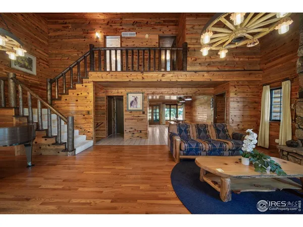 a view of living room kitchen with table and chairs