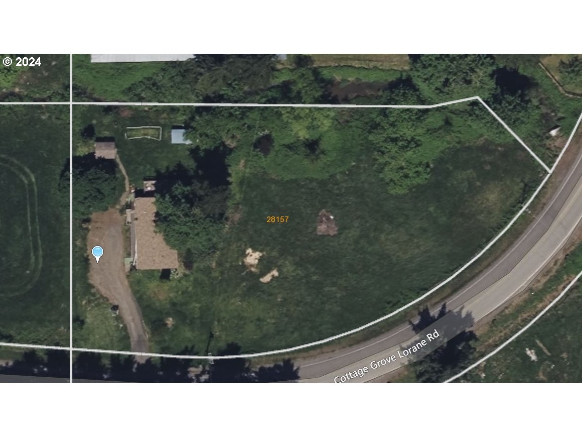 28157 Cottage Grove Lorane Road Cottage Grove, OR 97424 - Photo 32 of 33 a bathroom with a sink and mirror