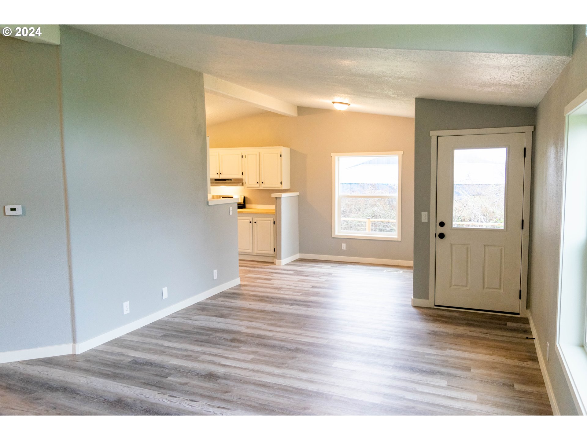28157 Cottage Grove Lorane Road Cottage Grove, OR 97424 - Photo 5 of 33 a view interior of the house and wooden floor