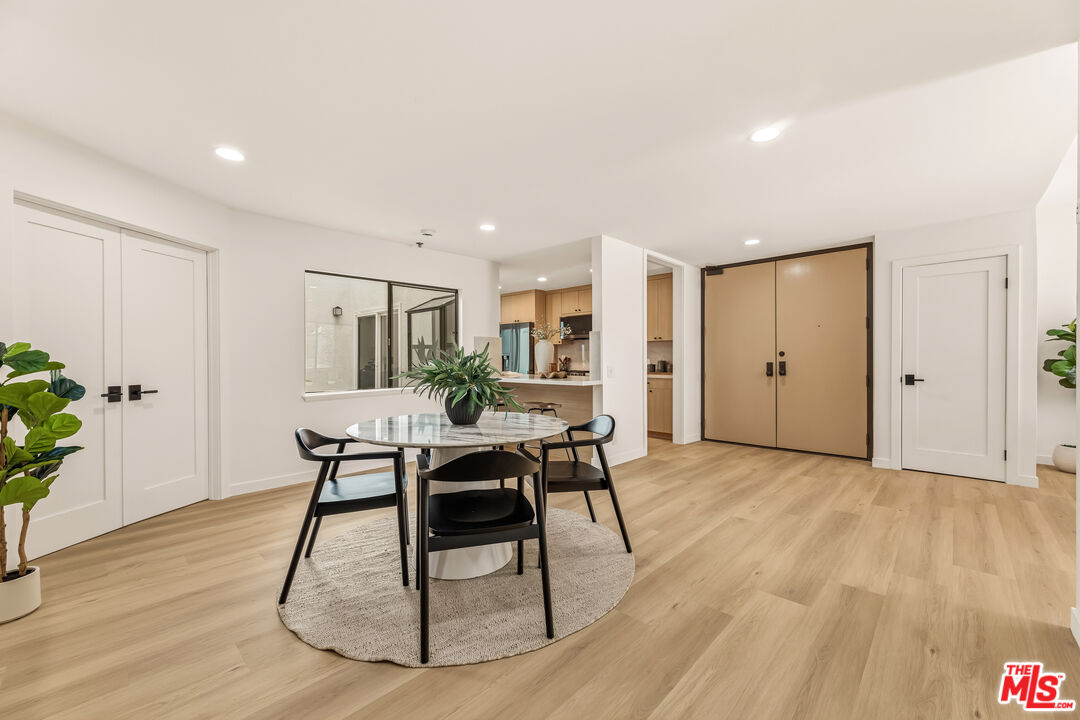311 Bora Bora Way, Unit 3207 Marina del Rey, CA 90292 - Photo 9 of 54 a view of a dining room with furniture and wooden floor