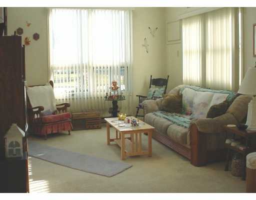 76 Quannacut Road, Unit 1 Westerly, RI 02891 - Photo 2 of 7 Living Room.