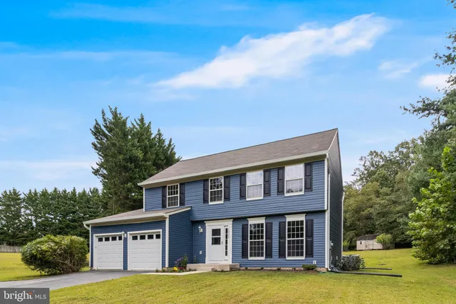 a view of a house with garden