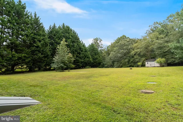 a view of outdoor space and yard
