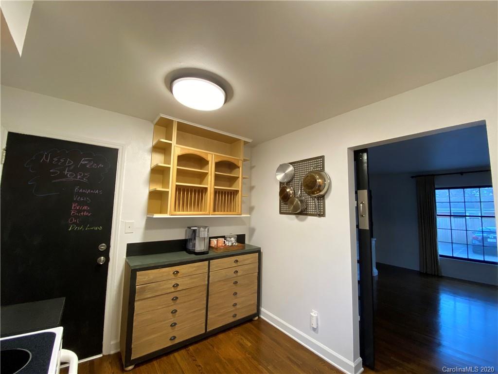 4317 Walker Road, Unit B Charlotte, NC 28211 - Photo 12 of 25 a bedroom with a bed and a window