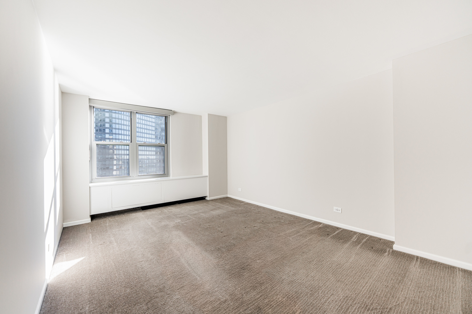 400 East Randolph Street, Unit 3629 Chicago, IL 60601 - Photo 12 of 36 an empty room with windows