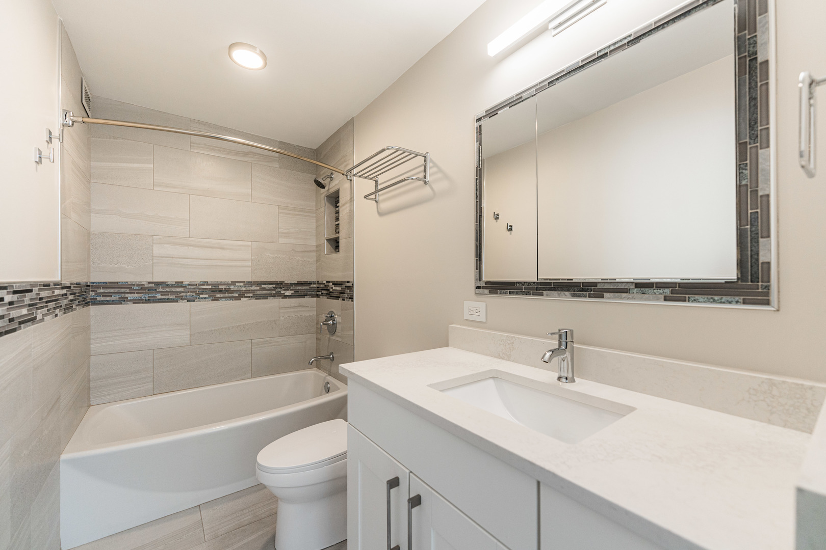 400 East Randolph Street, Unit 3629 Chicago, IL 60601 - Photo 14 of 36 a bathroom with a sink a toilet and a bathtub