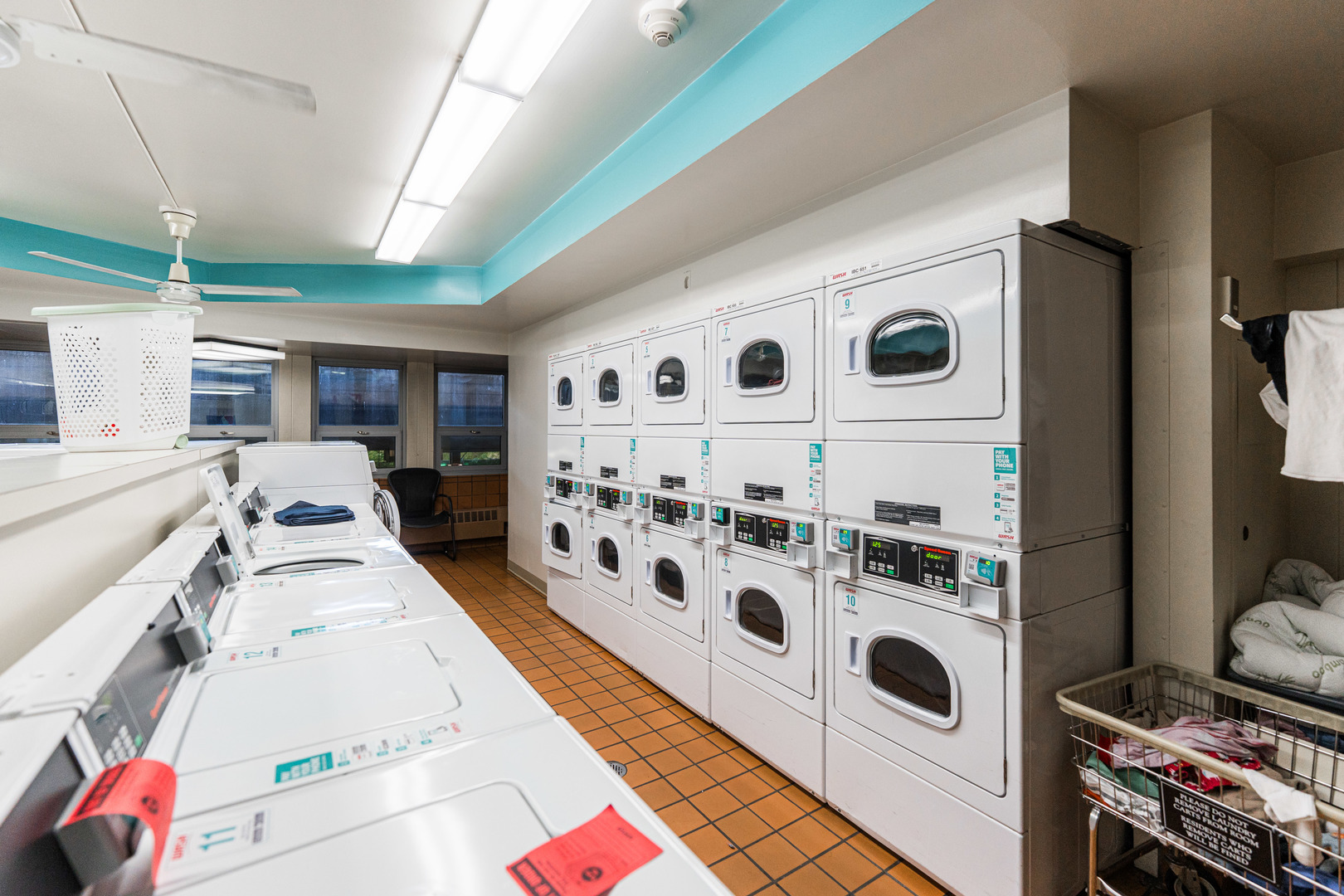 400 East Randolph Street, Unit 3629 Chicago, IL 60601 - Photo 31 of 36 a view of a kitchen with stainless steel appliances granite countertop a stove a sink and a microwave