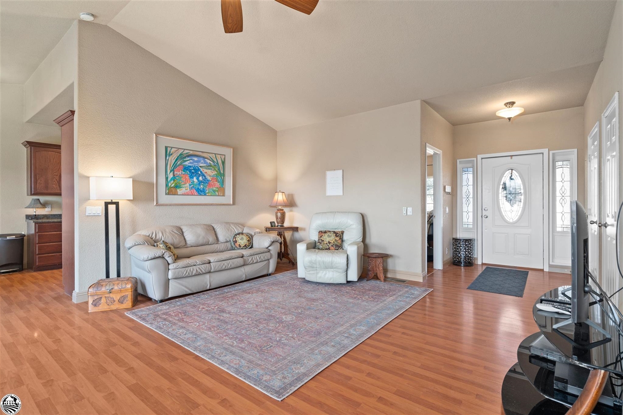 3102 Quail Hill Road Copperopolis, CA 95228 - Photo 17 of 60 a living room with furniture and wooden floor