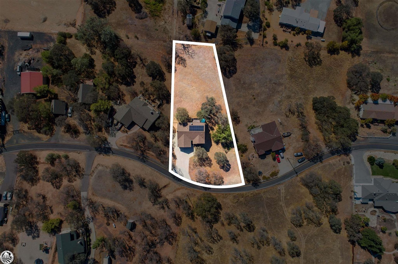 3102 Quail Hill Road Copperopolis, CA 95228 - Photo 2 of 60 an aerial view of a house with a yard
