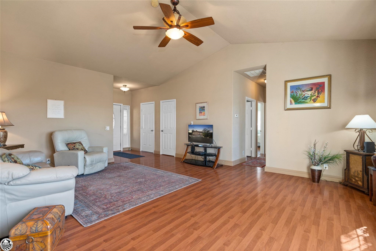 3102 Quail Hill Road Copperopolis, CA 95228 - Photo 25 of 60 a living room with furniture and a wooden floor
