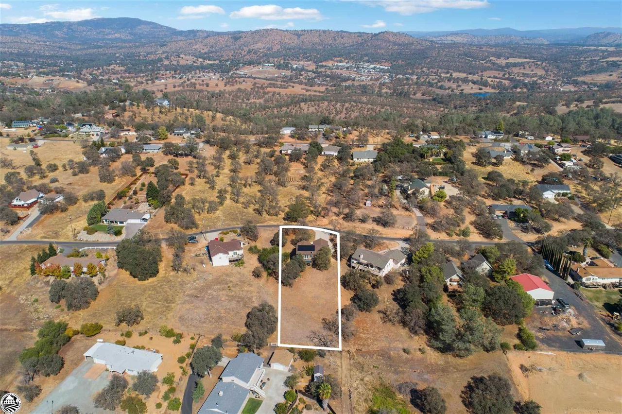 3102 Quail Hill Road Copperopolis, CA 95228 - Photo 45 of 60 an aerial view of residential houses with outdoor space