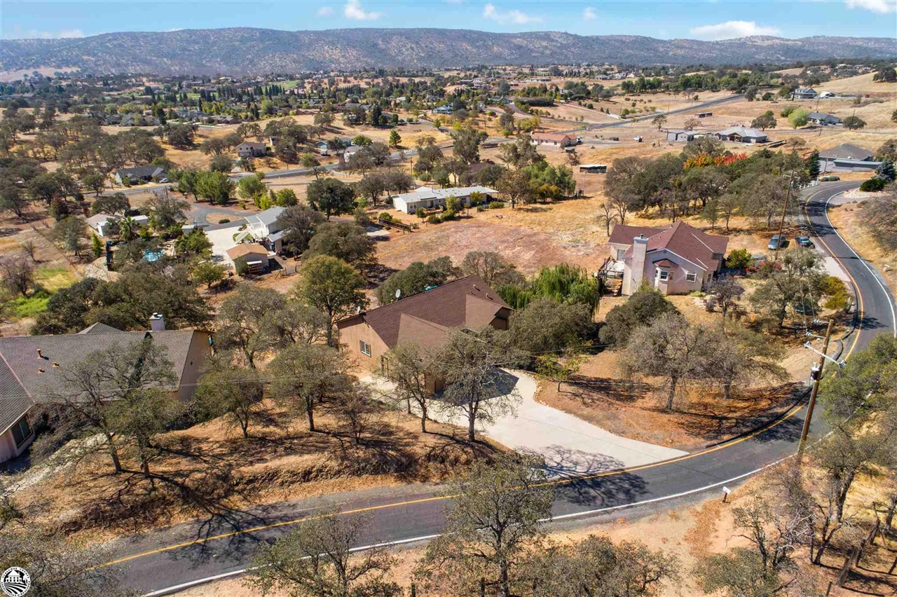 3102 Quail Hill Road Copperopolis, CA 95228 - Photo 59 of 60 an aerial view of residential houses with outdoor space