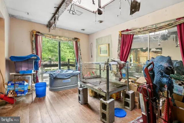 a view of a hallway with wooden shelves