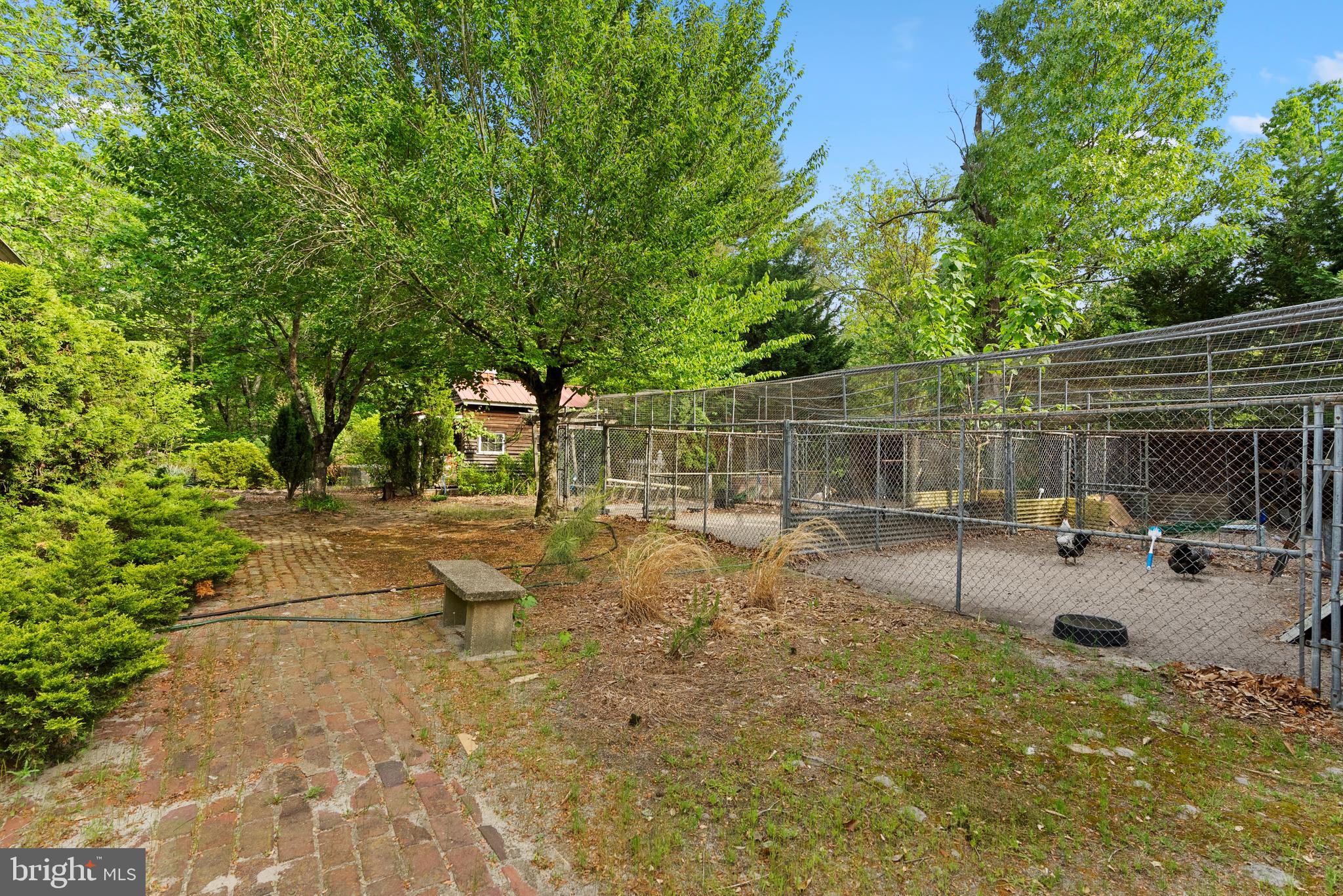 305 Hopewell Road Medford, NJ 08055 - Photo 25 of 30 a view of backyard with a table and chairs