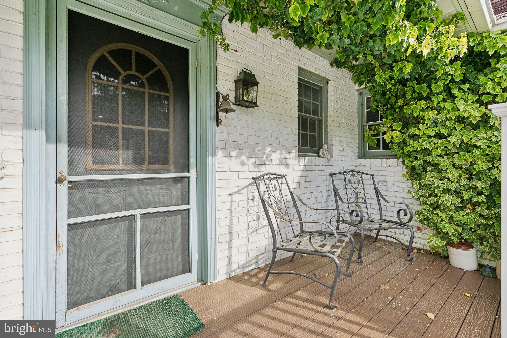 305 Hopewell Road Medford, NJ 08055 - Photo 5 of 30 a patio with table and chairs and potted plants