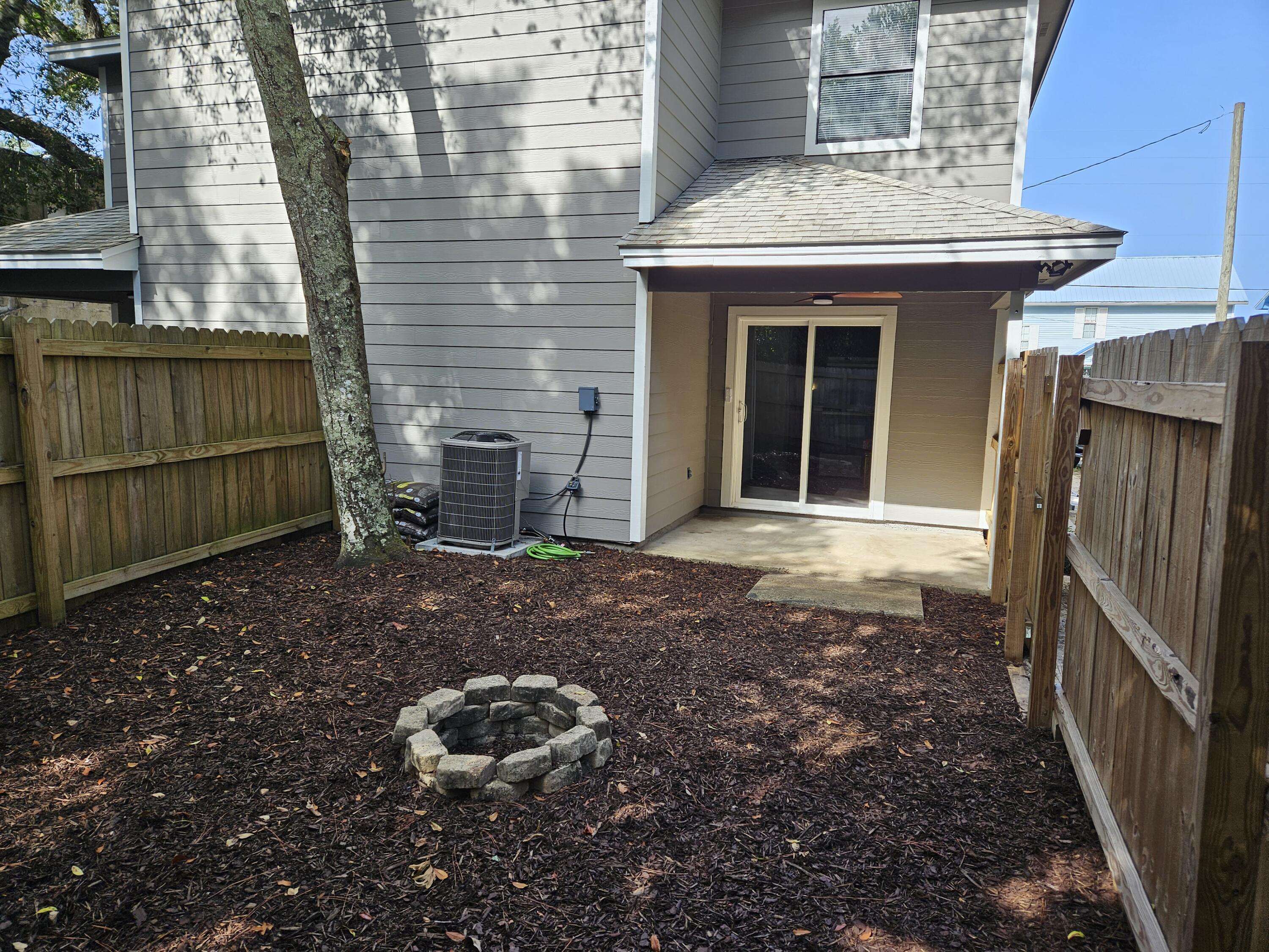 708 Bayshore Drive Niceville, FL 32578 - Photo 5 of 14 a front view of a house with a yard