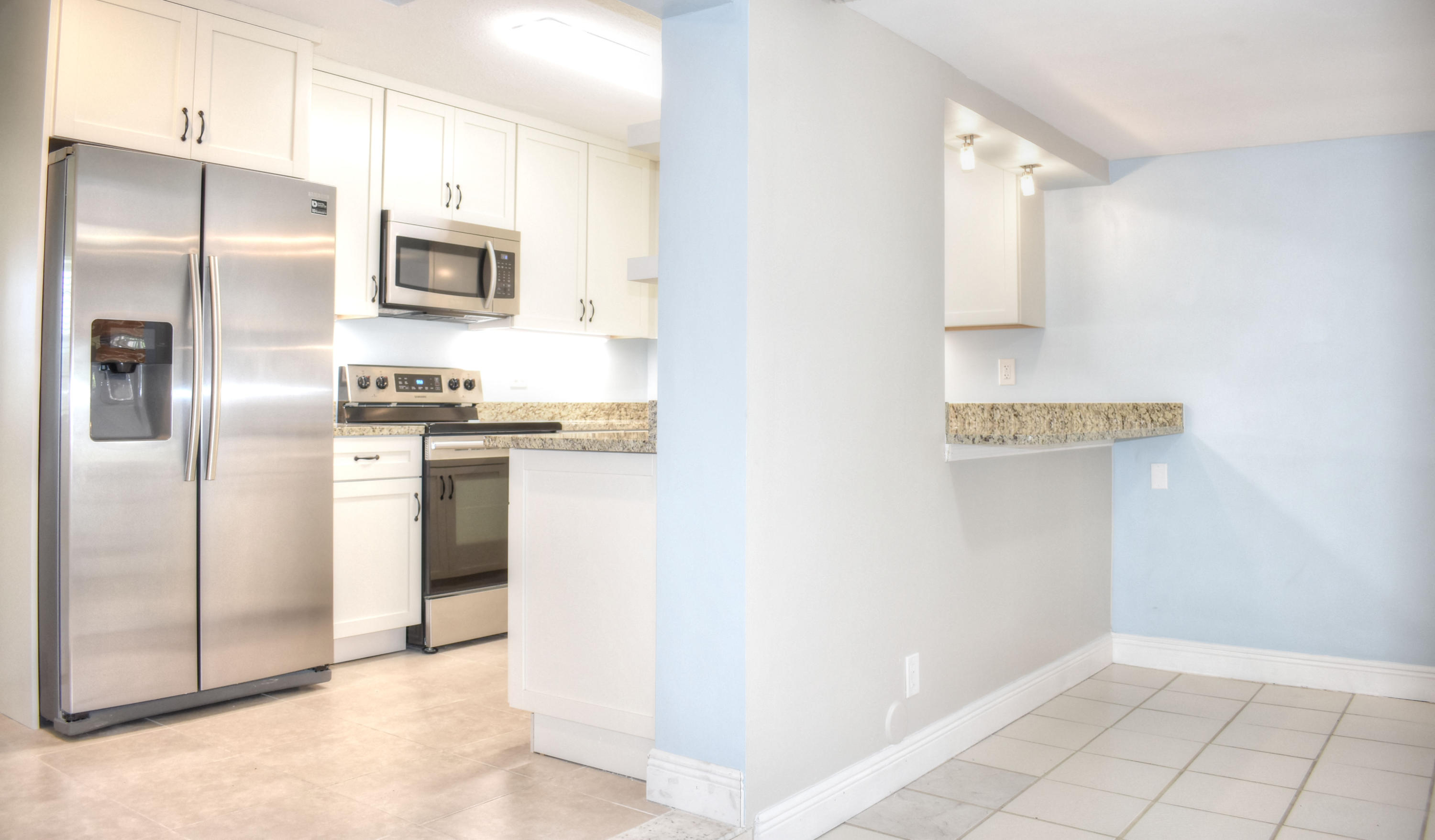 3698 Bahama Road Palm Beach Gardens, FL 33410 - Photo 7 of 25 kitchen