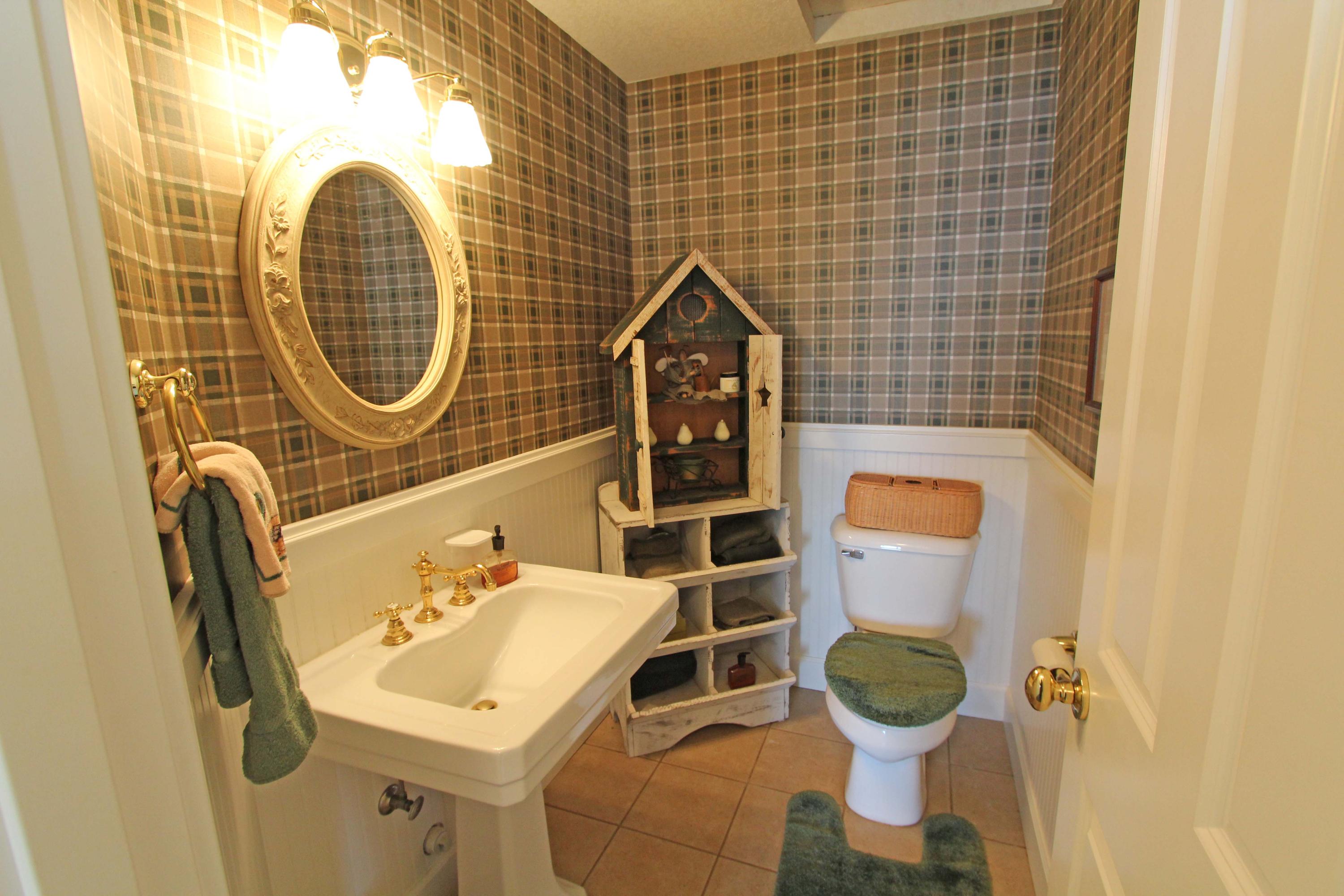 1815 Maxwell Mountain Road Oceanside, OR 97134 - Photo 21 of 26 main floor powder room