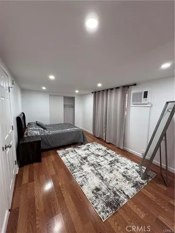 a view of a living room and kitchen