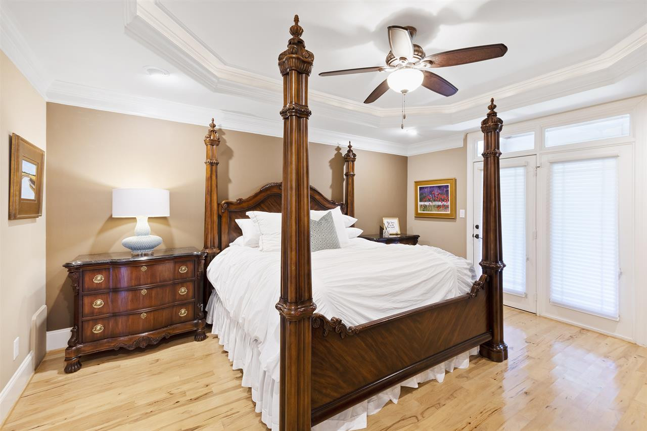 1806 10th Avenue Raleigh, NC 27607 - Photo 12 of 30 1st Floor Master with doors to the covered porch and elegant tray ceiling detail Master Bedroom