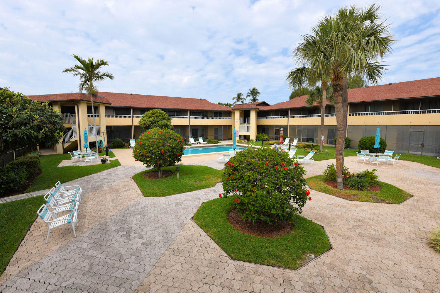 1100 Surf Road, Unit 216 Riviera Beach, FL 33404 - Photo 15 of 19 Courtyard with Pool view