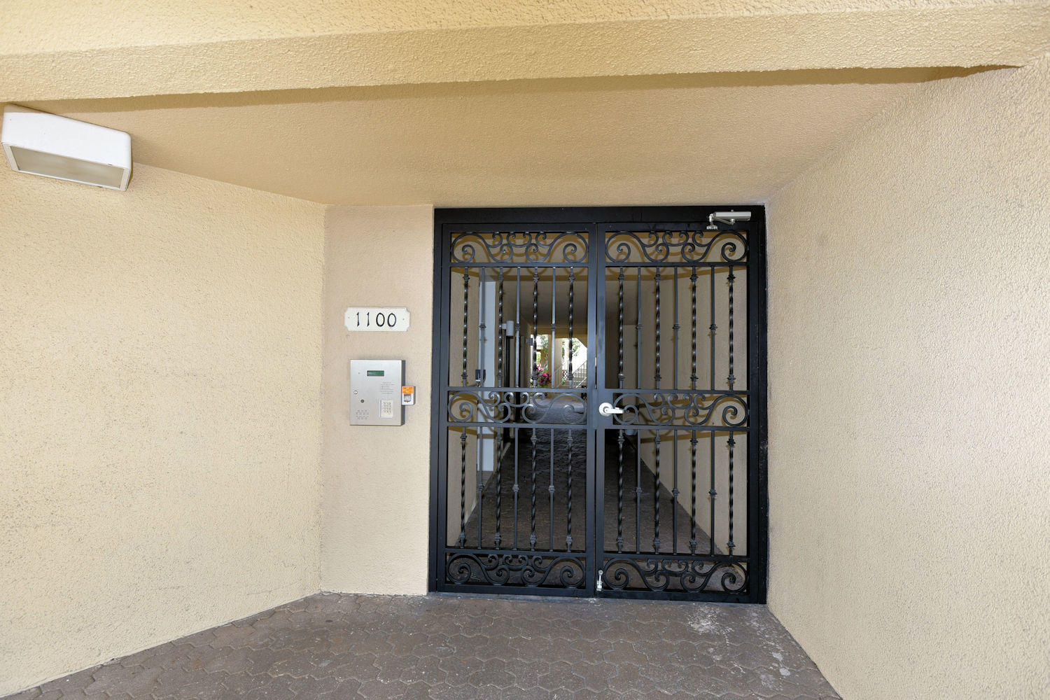 1100 Surf Road, Unit 216 Riviera Beach, FL 33404 - Photo 18 of 19 Gated entrance