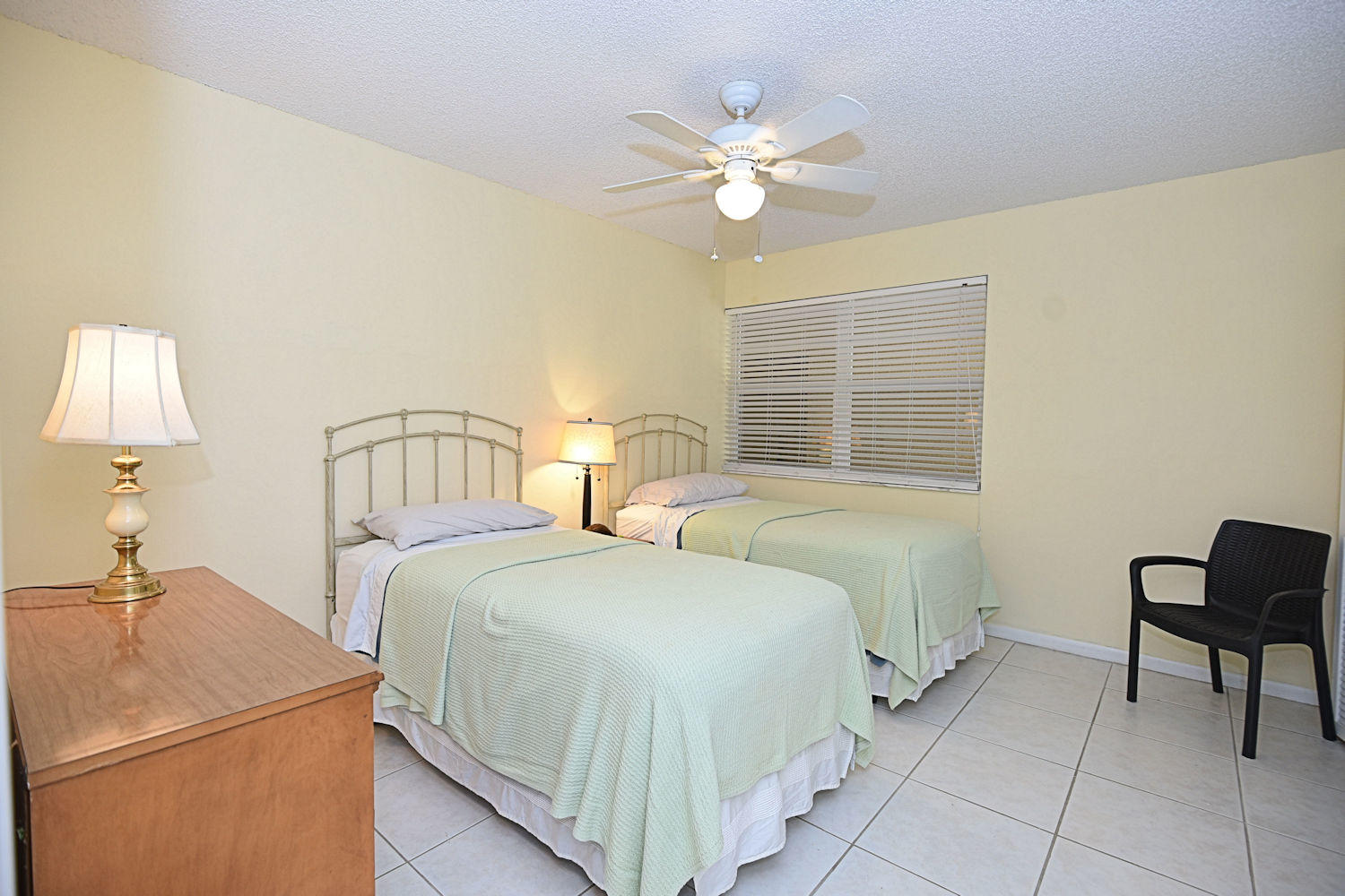 1100 Surf Road, Unit 216 Riviera Beach, FL 33404 - Photo 10 of 19 Guest Bedroom