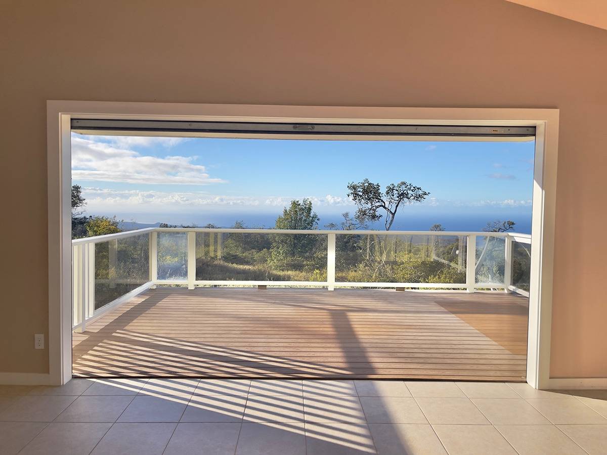Spectacular view of South Point, coastline and ocean horizon from the deck of 92-1536 Walaka Drive.