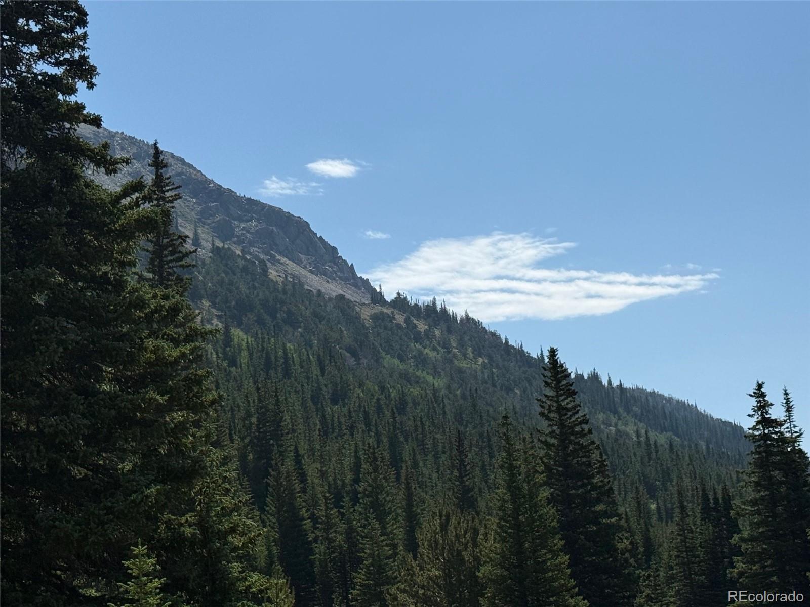 4880 4th Of July Road Nederland, CO 80466 - Photo 7 of 7 a view of a lake and a mountain view