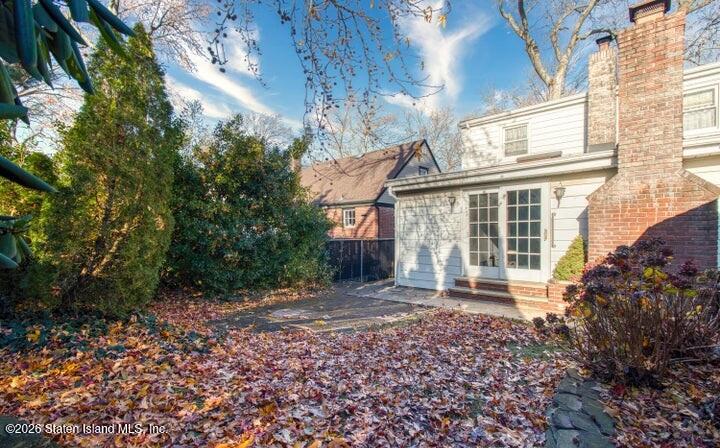 126 Goodwin Avenue Staten Island, NY 10314 - Photo 3 of 3 a front view of a house with a yard