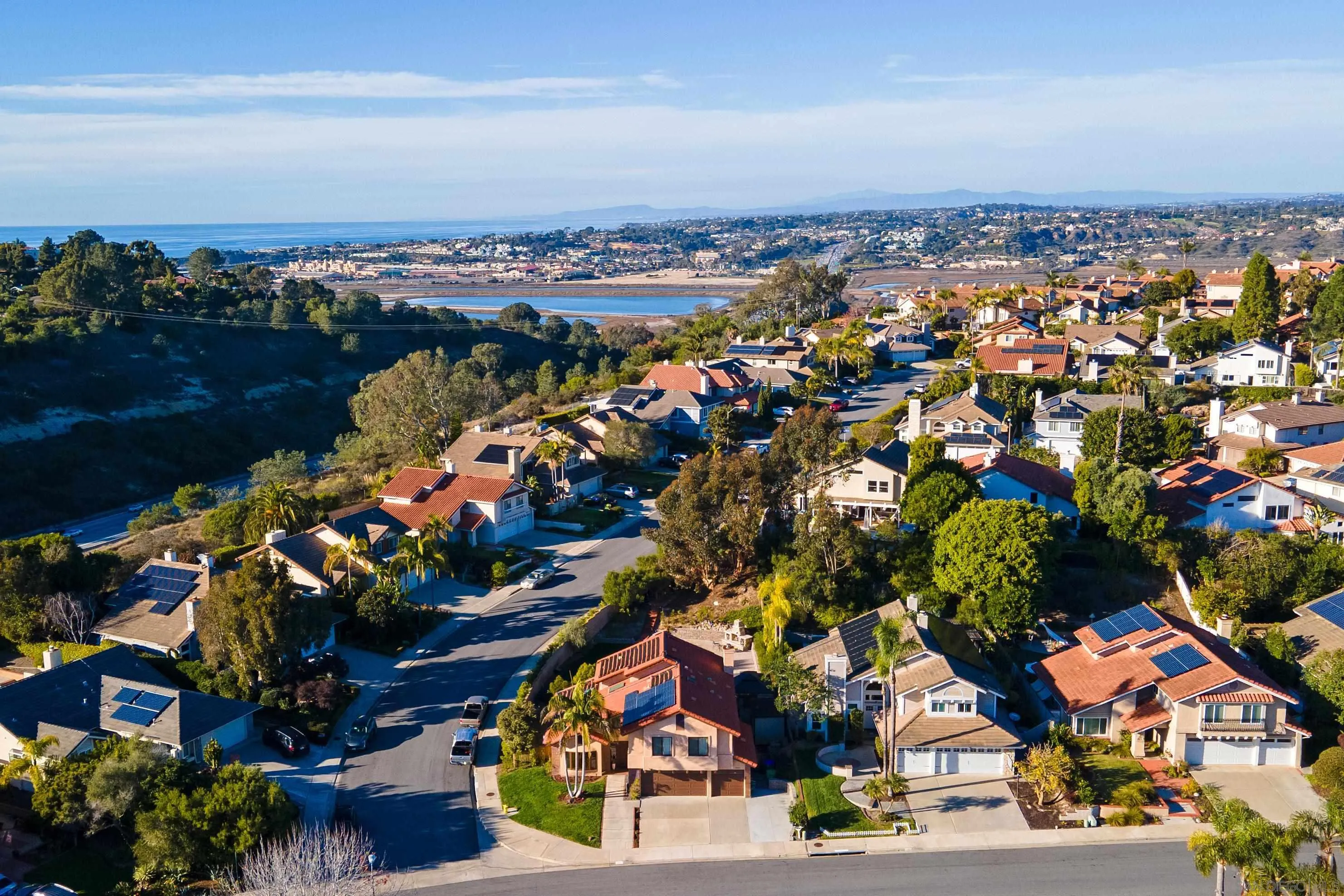 3245 Lower Ridge Road San Diego, CA 92130 - Photo 2 of 45 an aerial view of residential houses with outdoor space and swimming pool
