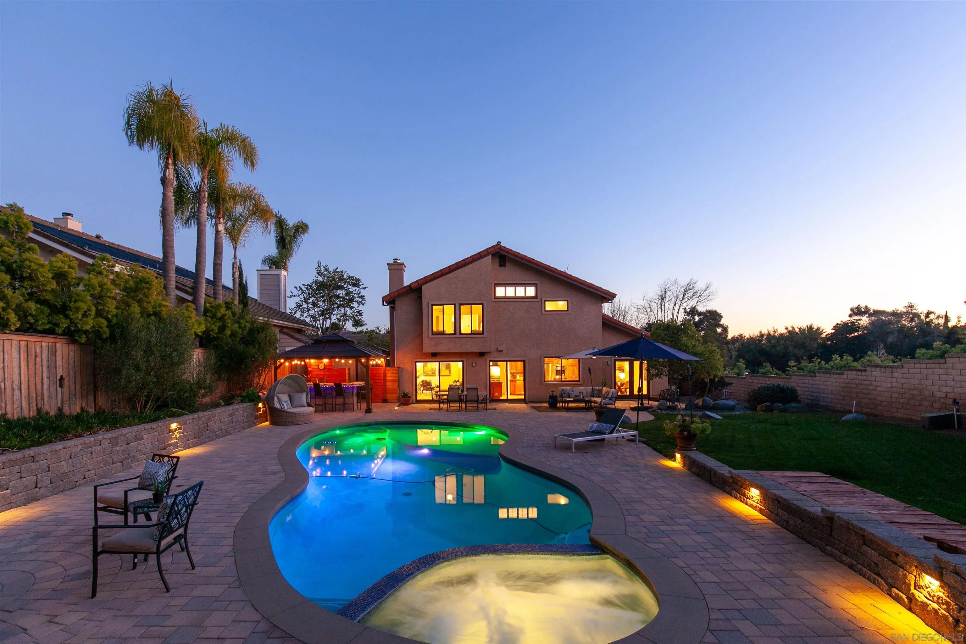3245 Lower Ridge Road San Diego, CA 92130 - Photo 43 of 45 a view of a swimming pool with a patio